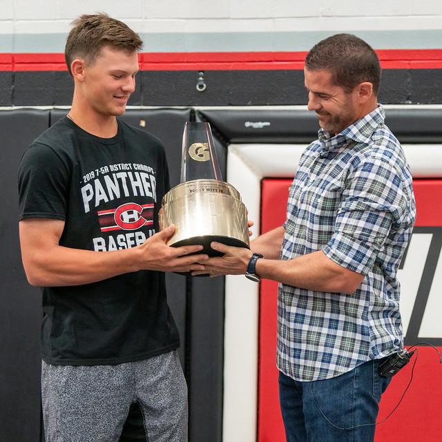 Witt is presented with the Gatorade Baseball Player of the Year award by former Texas Rangers infielder, Michael Young.
